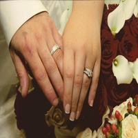 customer holding hand with diamond ring