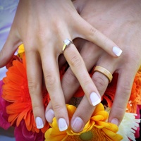 colorful photo of customer holding hand